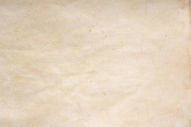 Aged paper sheet. Blank old background with dust and dirty stains. Vintage and antique art concept. Poster mockup. Detailed closeup studio shot. Front view. Toned