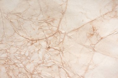 Aged paper sheet. Blank old background with dust and dirty stains. Vintage and antique art concept. Poster mockup. Detailed closeup studio shot. Front view. Toned