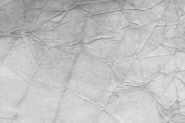 Eski kağıt çarşaf. Toz ve kirli lekelerle dolu boş bir arka plan. Eski ve antika sanat konsepti. Ayrıntılı yakın çekim stüdyo çekimi. Ön manzara. Ayarlanmış