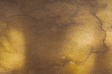 Aged paper sheet. Blank old background with dust and dirty stains. Vintage and antique art concept. Poster mockup. Detailed closeup studio shot. Front view. Toned