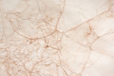 Aged paper sheet. Blank old background with dust and dirty stains. Vintage and antique art concept. Poster mockup. Detailed closeup studio shot. Front view. Toned