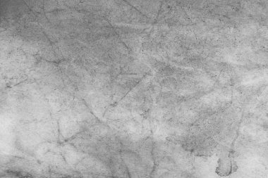 Eski kağıt çarşaf. Toz ve kirli lekelerle dolu boş bir arka plan. Eski ve antika sanat konsepti. Ayrıntılı yakın çekim stüdyo çekimi. Ön manzara. Ayarlanmış