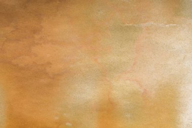 Aged paper sheet. Blank old background with dust and dirty stains. Vintage and antique art concept. Poster mockup. Detailed closeup studio shot. Front view. Toned