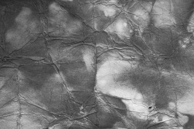 Eski kağıt çarşaf. Toz ve kirli lekelerle dolu boş bir arka plan. Eski ve antika sanat konsepti. Ayrıntılı yakın çekim stüdyo çekimi. Ön manzara. Ayarlanmış