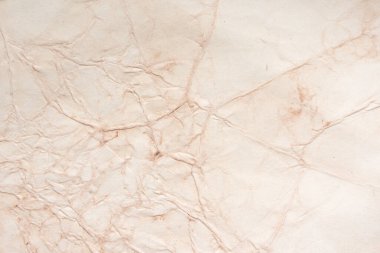 Aged paper sheet. Blank old background with dust and dirty stains. Vintage and antique art concept. Poster mockup. Detailed closeup studio shot. Front view. Toned