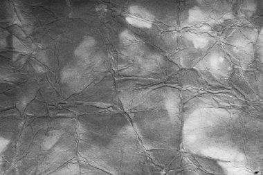 Eski kağıt çarşaf. Toz ve kirli lekelerle dolu boş bir arka plan. Eski ve antika sanat konsepti. Ayrıntılı yakın çekim stüdyo çekimi. Ön manzara. Ayarlanmış