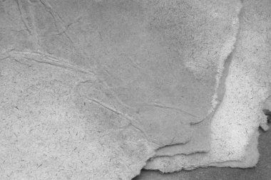 Eski kağıt çarşaf. Toz ve kirli lekelerle dolu boş bir arka plan. Eski ve antika sanat konsepti. Ayrıntılı yakın çekim stüdyo çekimi. Ön manzara. Ayarlanmış