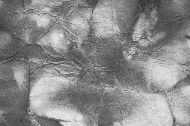 Eski kağıt çarşaf. Toz ve kirli lekelerle dolu boş bir arka plan. Eski ve antika sanat konsepti. Ayrıntılı yakın çekim stüdyo çekimi. Ön manzara. Ayarlanmış