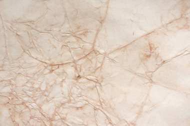 Aged paper sheet. Blank old background with dust and dirty stains. Vintage and antique art concept. Poster mockup. Detailed closeup studio shot. Front view. Toned