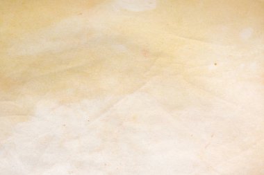 Aged paper sheet. Blank old background with dust and dirty stains. Vintage and antique art concept. Poster mockup. Detailed closeup studio shot. Front view. Toned