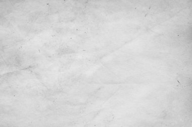 Eski kağıt çarşaf. Toz ve kirli lekelerle dolu boş bir arka plan. Eski ve antika sanat konsepti. Ayrıntılı yakın çekim stüdyo çekimi. Ön manzara. Ayarlanmış