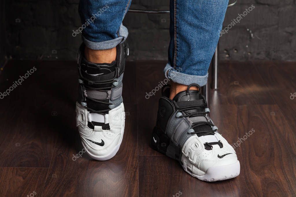 New beautiful colorful and nice Nike Air Max running shoes, sneakers, trainers showing the logo with a brand box on abstract background. Sport and casual footwear concept. Kyiv, Ukraine-August 7, 2018