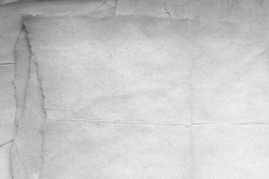 Eski kağıt çarşaf. Toz ve kirli lekelerle dolu boş bir arka plan. Eski ve antika sanat konsepti. Ayrıntılı yakın çekim stüdyo çekimi. Ön manzara. Ayarlanmış