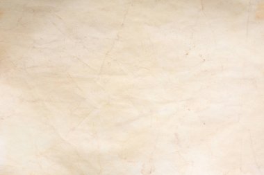 Aged paper sheet. Blank old background with dust and dirty stains. Vintage and antique art concept. Poster mockup. Detailed closeup studio shot. Front view. Toned