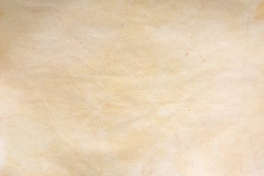 Aged paper sheet. Blank old background with dust and dirty stains. Vintage and antique art concept. Poster mockup. Detailed closeup studio shot. Front view. Toned