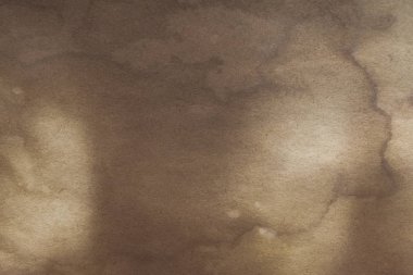 Aged paper sheet. Blank old background with dust and dirty stains. Vintage and antique art concept. Poster mockup. Detailed closeup studio shot. Front view. Toned