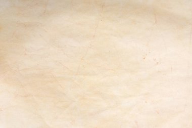 Aged paper sheet. Blank old background with dust and dirty stains. Vintage and antique art concept. Poster mockup. Detailed closeup studio shot. Front view. Toned