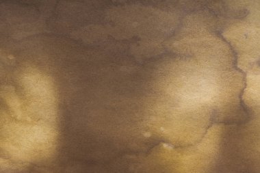 Aged paper sheet. Blank old background with dust and dirty stains. Vintage and antique art concept. Poster mockup. Detailed closeup studio shot. Front view. Toned