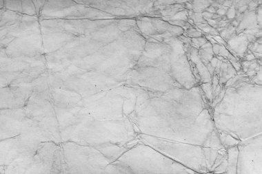 Eski kağıt çarşaf. Toz ve kirli lekelerle dolu boş bir arka plan. Eski ve antika sanat konsepti. Ayrıntılı yakın çekim stüdyo çekimi. Ön manzara. Ayarlanmış