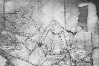 Eski kağıt çarşaf. Toz ve kirli lekelerle dolu boş bir arka plan. Eski ve antika sanat konsepti. Ayrıntılı yakın çekim stüdyo çekimi. Ön manzara. Ayarlanmış