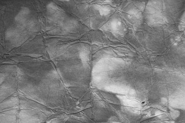 Eski kağıt çarşaf. Toz ve kirli lekelerle dolu boş bir arka plan. Eski ve antika sanat konsepti. Ayrıntılı yakın çekim stüdyo çekimi. Ön manzara. Ayarlanmış