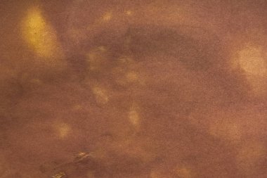 Aged paper sheet. Blank old background with dust and dirty stains. Vintage and antique art concept. Poster mockup. Detailed closeup studio shot. Front view. Toned