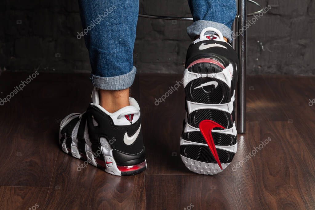 New beautiful colorful and nice Nike Air Max running shoes, sneakers, trainers showing the logo with a brand box on abstract background. Sport and casual footwear concept. Kyiv, Ukraine-August 7, 2018
