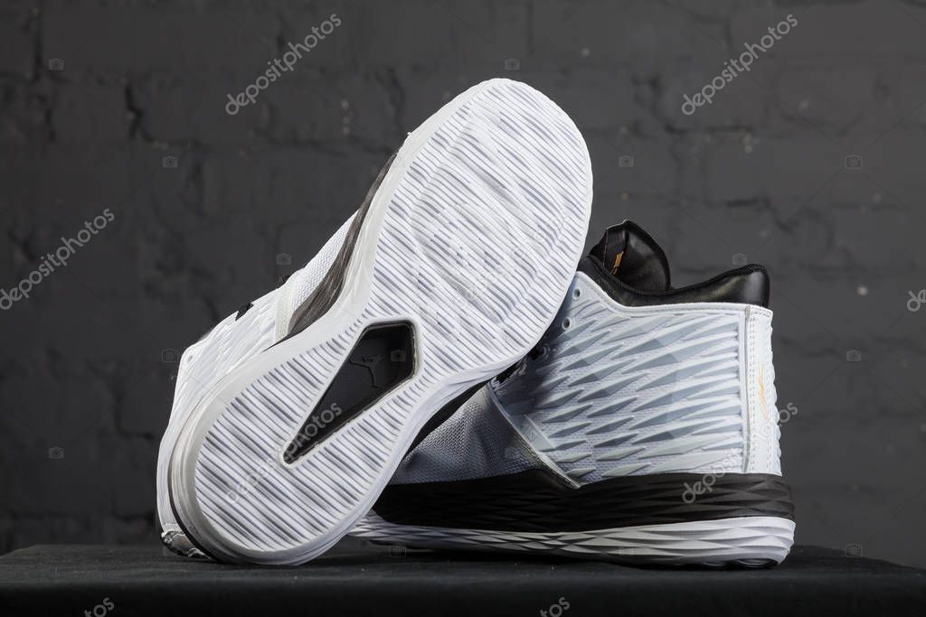New beautiful colorful and nice Nike Air Max running shoes, sneakers, trainers shows logo with a brand box on abstract background. Sport and casual footwear concept. Kyiv, Ukraine-December 9, 2017