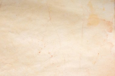 Aged paper sheet. Blank old background with dust and dirty stains. Vintage and antique art concept. Poster mockup. Detailed closeup studio shot. Front view. Toned