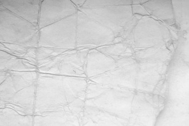 Eski kağıt çarşaf. Toz ve kirli lekelerle dolu boş bir arka plan. Eski ve antika sanat konsepti. Ayrıntılı yakın çekim stüdyo çekimi. Ön manzara. Ayarlanmış