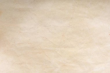 Aged paper sheet. Blank old background with dust and dirty stains. Vintage and antique art concept. Poster mockup. Detailed closeup studio shot. Front view. Toned