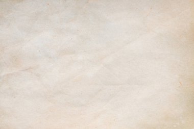 Aged paper sheet. Blank old background with dust and dirty stains. Vintage and antique art concept. Poster mockup. Detailed closeup studio shot. Front view. Toned