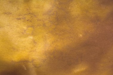 Aged paper sheet. Blank old background with dust and dirty stains. Vintage and antique art concept. Poster mockup. Detailed closeup studio shot. Front view. Toned