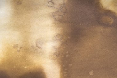 Aged paper sheet. Blank old background with dust and dirty stains. Vintage and antique art concept. Poster mockup. Detailed closeup studio shot. Front view. Toned