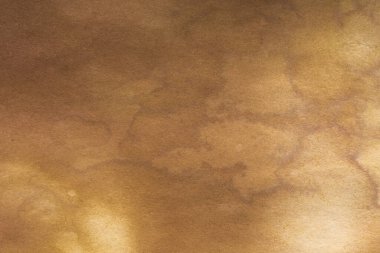 Aged paper sheet. Blank old background with dust and dirty stains. Vintage and antique art concept. Poster mockup. Detailed closeup studio shot. Front view. Toned