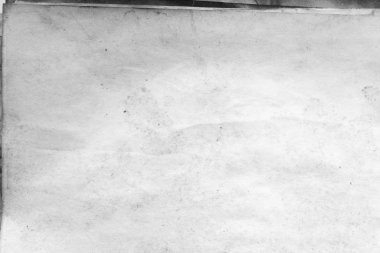 Eski kağıt çarşaf. Toz ve kirli lekelerle dolu boş bir arka plan. Eski ve antika sanat konsepti. Ayrıntılı yakın çekim stüdyo çekimi. Ön manzara. Ayarlanmış