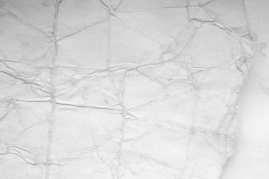 Eski kağıt çarşaf. Toz ve kirli lekelerle dolu boş bir arka plan. Eski ve antika sanat konsepti. Ayrıntılı yakın çekim stüdyo çekimi. Ön manzara. Ayarlanmış