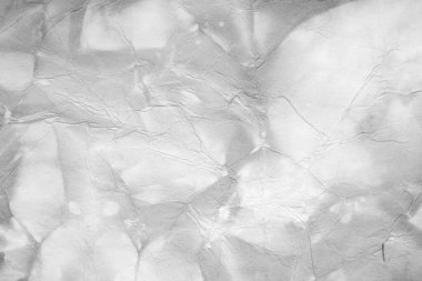 Eski kağıt çarşaf. Toz ve kirli lekelerle dolu boş bir arka plan. Eski ve antika sanat konsepti. Ayrıntılı yakın çekim stüdyo çekimi. Ön manzara. Ayarlanmış