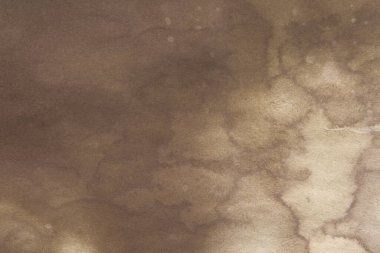 Aged paper sheet. Blank old background with dust and dirty stains. Vintage and antique art concept. Poster mockup. Detailed closeup studio shot. Front view. Toned