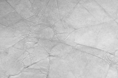 Eski kağıt çarşaf. Toz ve kirli lekelerle dolu boş bir arka plan. Eski ve antika sanat konsepti. Ayrıntılı yakın çekim stüdyo çekimi. Ön manzara. Ayarlanmış