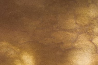 Aged paper sheet. Blank old background with dust and dirty stains. Vintage and antique art concept. Poster mockup. Detailed closeup studio shot. Front view. Toned