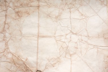 Aged paper sheet. Blank old background with dust and dirty stains. Vintage and antique art concept. Poster mockup. Detailed closeup studio shot. Front view. Toned