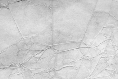 Eski kağıt çarşaf. Toz ve kirli lekelerle dolu boş bir arka plan. Eski ve antika sanat konsepti. Ayrıntılı yakın çekim stüdyo çekimi. Ön manzara. Ayarlanmış