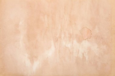 Boş eski kağıt çarşaf. Eski toprak ve kirli lekelerle dolu bir arka plan. Eski ve antika sanat konsepti. Karton, taş, beton ya da doğal mermer gibi bir doku. Poster modeli.