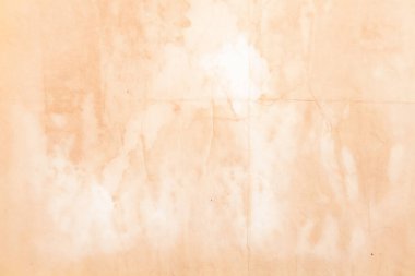 Boş eski kağıt çarşaf. Eski toprak ve kirli lekelerle dolu bir arka plan. Eski ve antika sanat konsepti. Karton, taş, beton ya da doğal mermer gibi bir doku. Poster modeli.