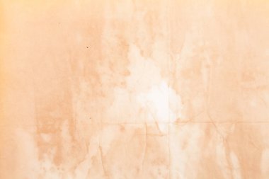 Boş eski kağıt çarşaf. Eski toprak ve kirli lekelerle dolu bir arka plan. Eski ve antika sanat konsepti. Karton, taş, beton ya da doğal mermer gibi bir doku. Poster modeli.