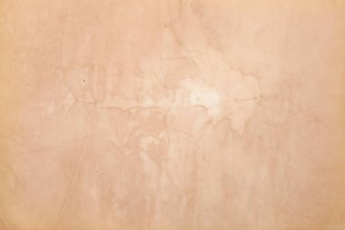 Boş eski kağıt çarşaf. Eski toprak ve kirli lekelerle dolu bir arka plan. Eski ve antika sanat konsepti. Karton, taş, beton ya da doğal mermer gibi bir doku. Poster modeli. 
