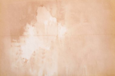Boş eski kağıt çarşaf. Eski toprak ve kirli lekelerle dolu bir arka plan. Eski ve antika sanat konsepti. Karton, taş, beton ya da doğal mermer gibi bir doku. Poster modeli. 