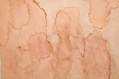 Boş eski kağıt çarşaf. Eski toprak ve kirli lekelerle dolu bir arka plan. Eski ve antika sanat konsepti. Karton, taş, beton ya da doğal mermer gibi bir doku. Poster modeli.