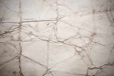 Eski kağıt çarşaf. Toz ve kirli lekelerle dolu boş bir arka plan. Eski ve antika sanat konsepti. Ayrıntılı yakın çekim stüdyo çekimi. Ön manzara. Ayarlanmış